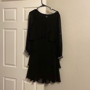 Knee length tiered dress with jeweled sleeves